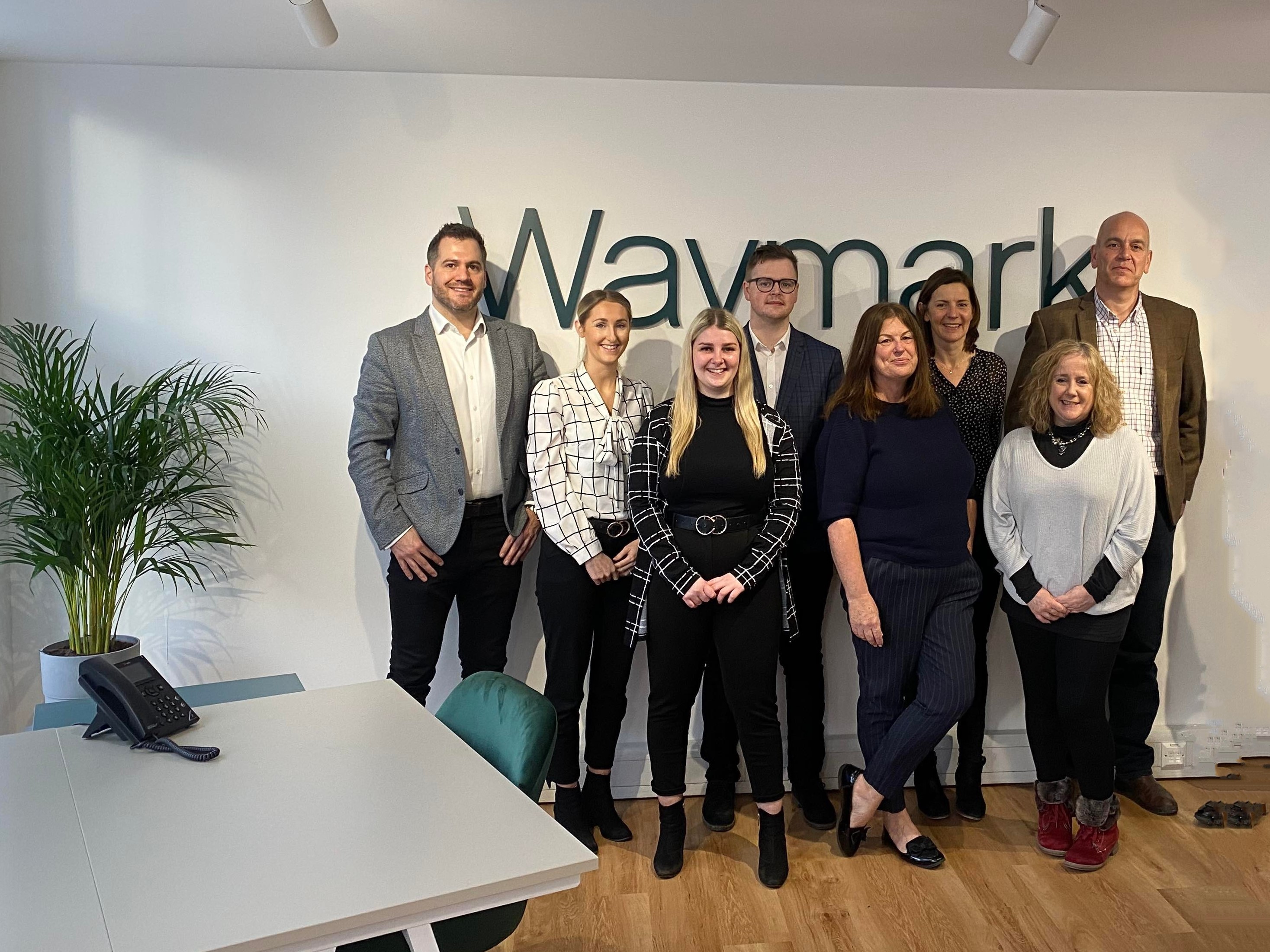 Full team inside new waymark office